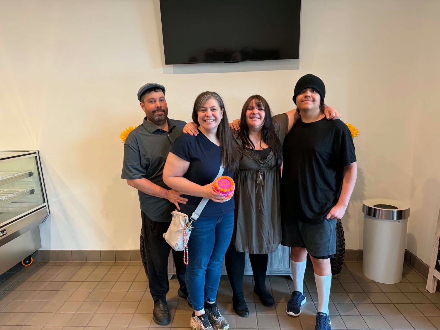 The Sunflour Cakes family — Brandon, Mindy, Holly, and Cody in the bakery